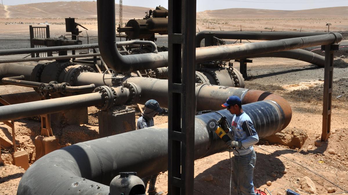 A worker at Syria's Arak gasfield. Russian companies are keen to business deals in Syria, particularly in the oil and gas sector AFP.jpg
