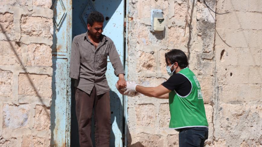 "IHH" تقدم مساعدات إنسانية لـ 5000 عائلة في ريف إدلب | صور