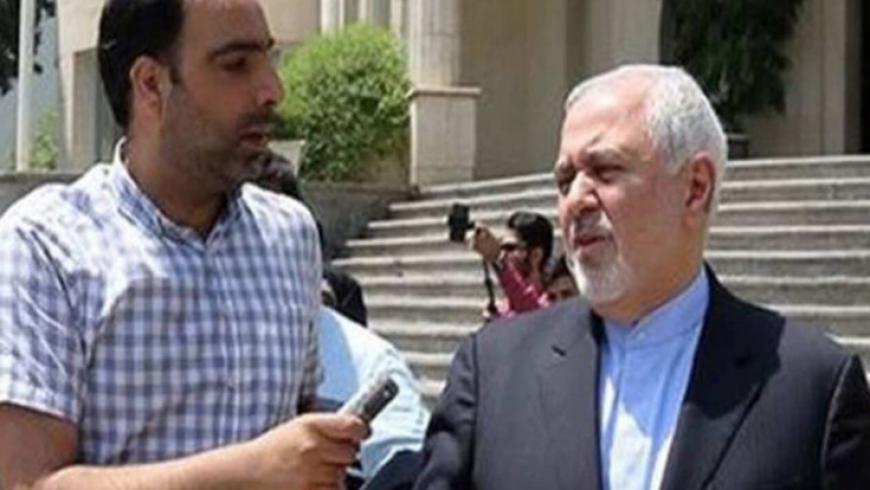 صحفي إيراني يفاجئ ظريف ويقدّم طلب لجوء في السويد