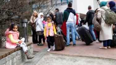 لاجئون سوريون في ألمانيا (رويترز)