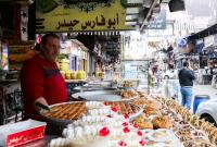 2021-04-12t090615z_1378102367_rc29um9qevn8_rtrmadp_3_religion-ramadan-syria-sweets.jpg