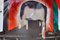 نظام الأسد يبتز تجار الغوطة الشرقية بتكاليف الحملة الانتخابية 