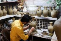 20210707105130reup-2021-07-07t105006z_1565556001_rc2yeo9u4u10_rtrmadp_3_syria-industry-pottery.h_1.jpg
