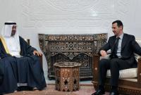 بشار الأسد ومحمد بن زايد (أرشيفية)