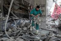 ps_a-syrian-man-inspect-a-hospital-damaged-following-an-air-strike-a-rebel-controlled-town-in-eastern-ghouta_may-1-2017_photo_sameer-al-doumy_afp_getty-images_675486672-cropped.jpg