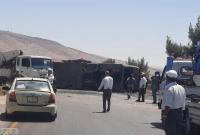 عناصر الشرطة حول البولمان في موقع الحادث (وزارة النقل التابع للنظام السوري)