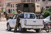عناصر للنظام في درعا (AFP)