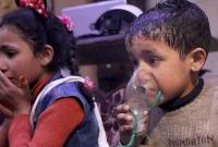 أطفال مصابين في هجوم كيماوي للنظام السوري على الغوطة الشرقية عام 2013 (الأناضول)
