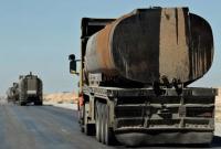 صهاريج تحمل النفط من مناطق سيطرة "قسد" إلى مناطق سيطرة النظام السوري - AFP