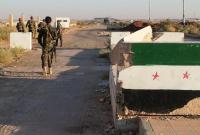 عناصر من قوات النظام السوري في محافظة درعا - رويترز