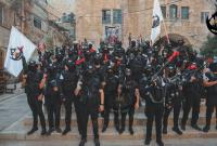 صورة جماعية لعناصر مجموعة "عرين الأسد"، نابلس شمالي الضفة، 2 أيلول/سبتمبر 2022 (قناة عرين الأسود على التليغرام)