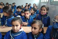 طلاب في أحد المدارس في مناطق سيطرة النظام السوري - إنترنت