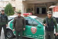 عناصر من شرطة النظام السوري أمام مخفر حلب الجديدة - إنترنت