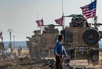 رتل من المدرعات الأميركية بالقرب من مدينة القحطانية شمال شرقي محافظة الحسكة - 31 من تشرين الأول 2019 (AFP)