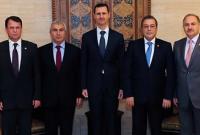 رئيس النظام السوري بشار الأسد مع أعضاء من حزب الشعب الجمهوري (Türkiye Gazetesi)