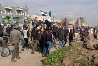 مظاهرة في مدينة جاسم شمالي درعا/ 21 كانون الأول 2022 (غرف أخبار محلية -واتساب) 