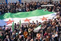 مظاهرة في سوريا رافضة للتطبيع التركي مع النظام السوري (رويترز)