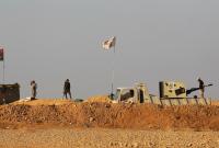 ميليشيات إيرانية على الساتر الحدودي بين العراق وسوريا – AFP