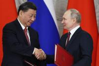 فلاديمير بوتين ينفي تأسيس تحالف عسكري مع الصين 