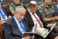 رئيس الوزراء الإسرائيلي بنيامين نتنياهو ووزير الأمن القومي إيتمار بن غفير يؤديان طقساً دينياً، إسرائيل، آذار/مارس 2023 (الإعلام الإسرائيلي)