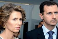 رئيس النظام السوري بشار الأسد وزوجته أسماء (AP)