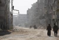 الدمار في مخيم اليرموك جنوبي دمشق (AP)