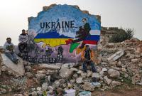 لوحة جدارية في مدينة إدلب شمال غربي سوريا للتضامن مع أوكرانيا ضد الغزو الروسي - إنترنت