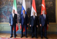 وزراء خارجية تركيا والنظام السوري وروسيا وإيران خلال الاجتماع الرباعي في موسكو - 10 أيار 2023 (رويترز)