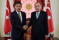 الرئيس التركي رجب طيب أردوغان يستقبل سنان أوغان في قصر دولمة بهتشة (رويترز)