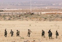 عناصر من قوات النظام بريف درعا (رويترز)