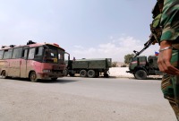 قوات للنظام وروسيا قرب دوما بريف بريف دمشق ـ رويترز
