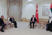 وزير المالية التركي محمد شيمشك برفقة نائب الرئيس التركي جودت يلماز يزوران الإمارات العربية المتحدة (الأناضول)