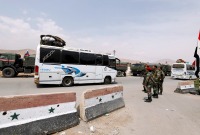 حاجز لقوات النظام السوري قرب دوما بريف دمشق ـ رويترز