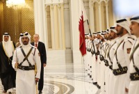من مراسم استقبال أمير قطر لرئيس تركيا في قصر لوسيل بالدوحة - 18 تموز 2023 (الأناضول)