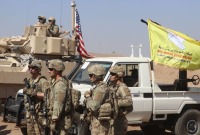 مناورات عسكرية بين التحالف الدولي و"قسد" شمال شرقي سوريا - رويترز