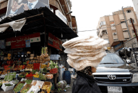 أحد الأسواق في مدينة دمشق - رويترز