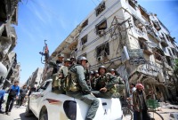 عناصر من قوات النظام في دوما بريف دمشق ـ رويترز