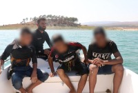 إنقاذ فتيان من الغرق في بحيرة ميدانكي، 25 آب 2023 (الدفاع المدني السوري)