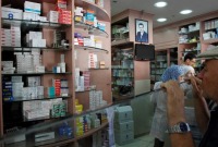 مناطق سيطرة النظام تشهد أزمة دواء متصاعدة (AFP)
