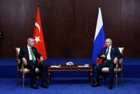 الرئيس الروسي فلاديمير بوتين والرئيس التركي رجب طيب أردوغان (رويترز)