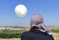 لأول مرة منذ عامين.. عودة إطلاق بالونات حارقة من قطاع غزة يتسبب بحريق في مستوطنة