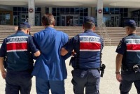 الجندرما التركية تنقل المشتبه به السوري إلى المحكمة (DHA)