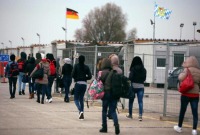 مهاجرون قرب ميونيخ في ألمانيا - رويترز