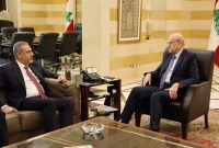 وزير الخارجية التركي هاكان فيدان أثناء زيارته بيروت ولقاء رئيس الوزراء اللبناني نجيب ميقاتي (الأناضول)