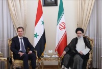 رئيسي وبشار الأسد
