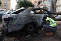 سيارة محترقة عقب غارة نفذتها طائرة مسيرة في الضاحية الجنوبية ـ رويترز