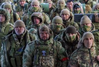 عناصر من القوات الروسية يسافرون للقتال في أوكرانيا ـ رويترز