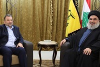 زعيم "حزب الله" حسن نصر الله ونائب رئيس المكتب السياسي لحركة "حماس" صالح العاروري