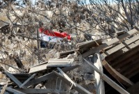 صورة أرشيفية لدمار نتيجة غارة إسرائيلية على مواقع للنظام في سوريا (AFP)