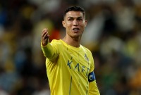 كان رونالدو أظهر غضبه بطريقة مشينة أمام جماهير نادي الشباب على هتافها "ميسي.. ميسي" - AFP